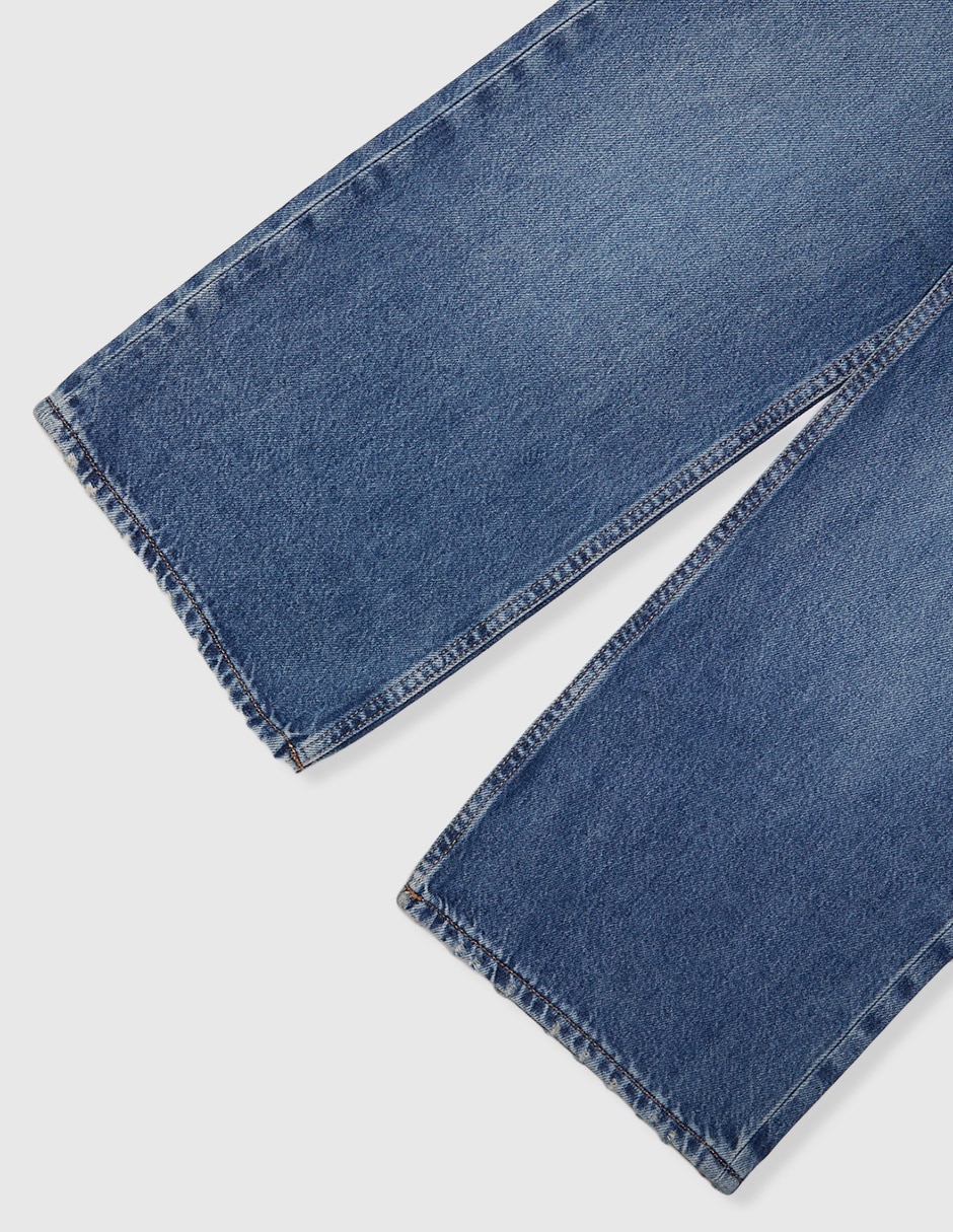 Jeans straight lavado desgastado para niña