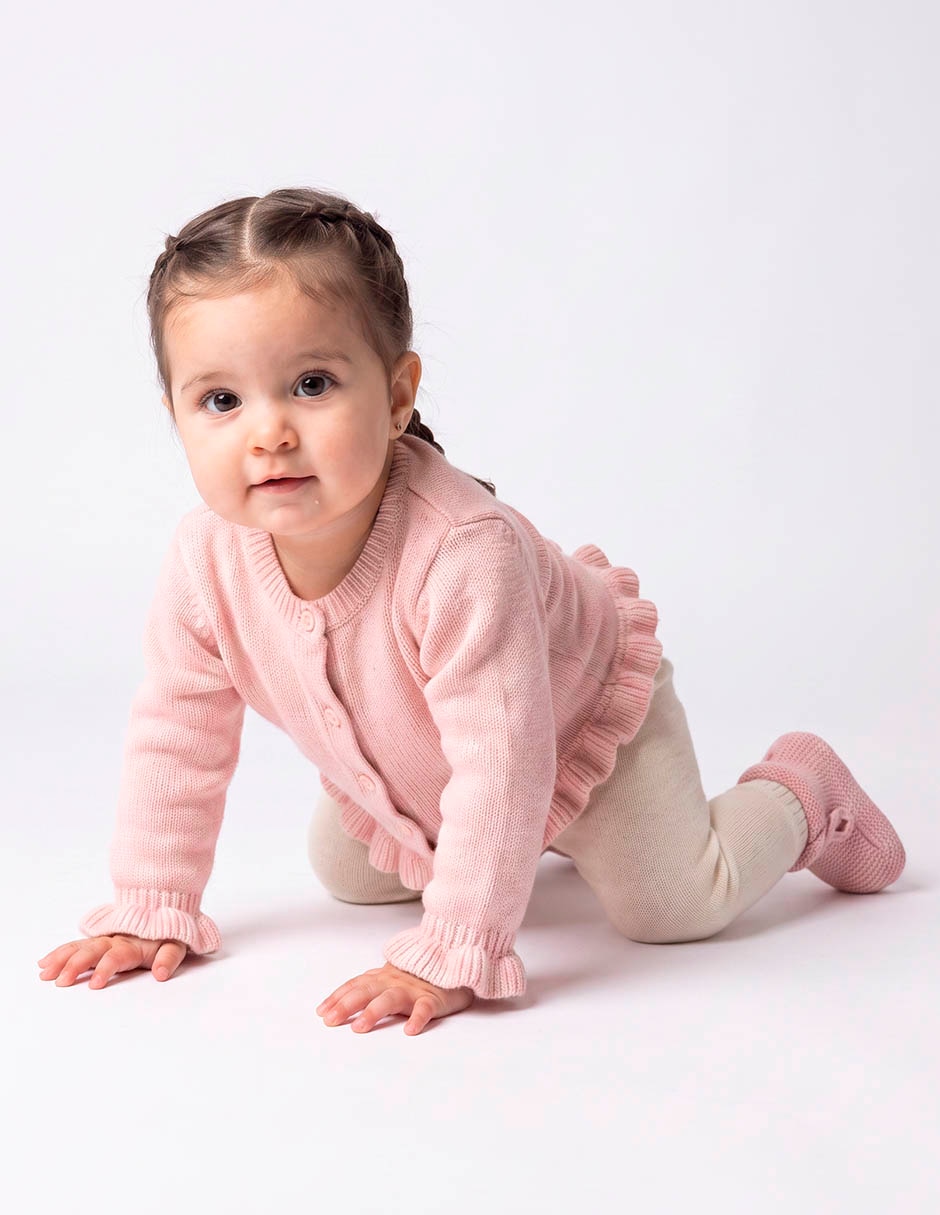 Suéter con olanes para niña Suéter con olanes para niña